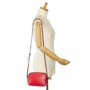 Valentino Garavani Mini Rockstud Cherry Red Shoulder Bag.